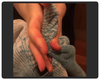 hands drying with towel